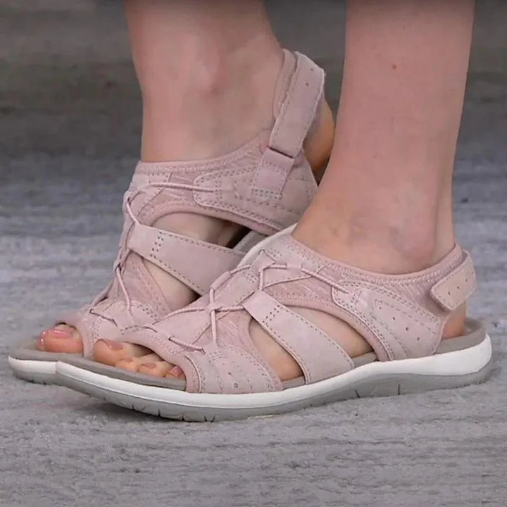Blue velcro strap cutout sandal, three-quarter view