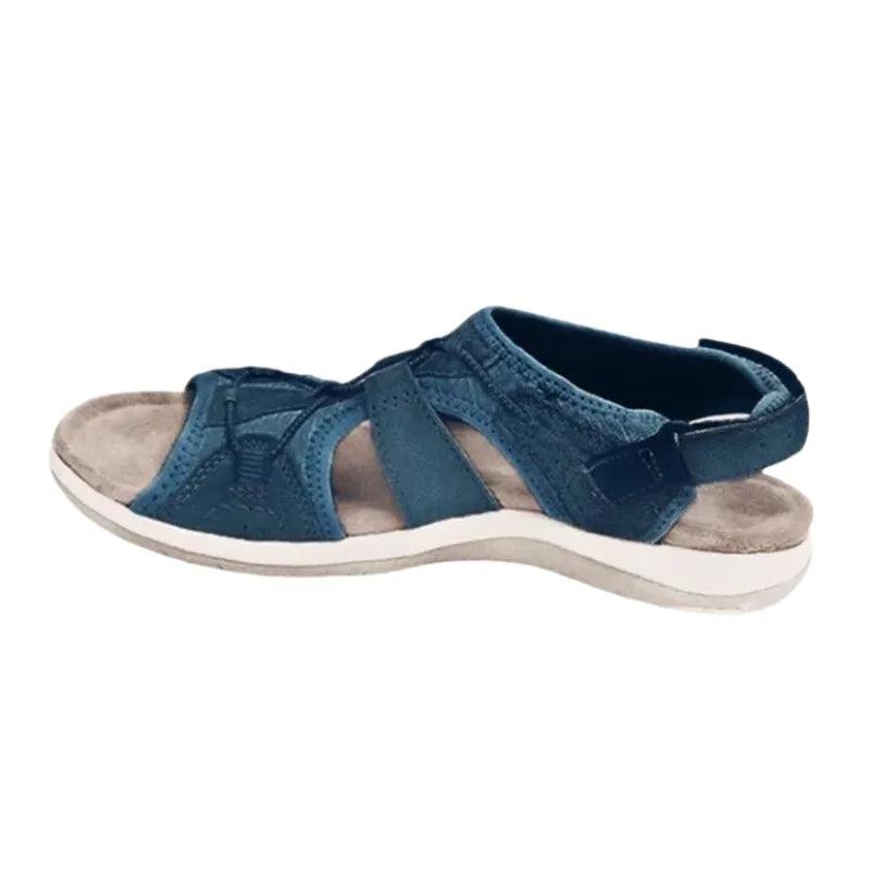 Navy blue velcro strap cutout sandal, overhead view