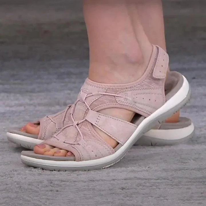 Pink velcro strap cutout sandal, heel view
