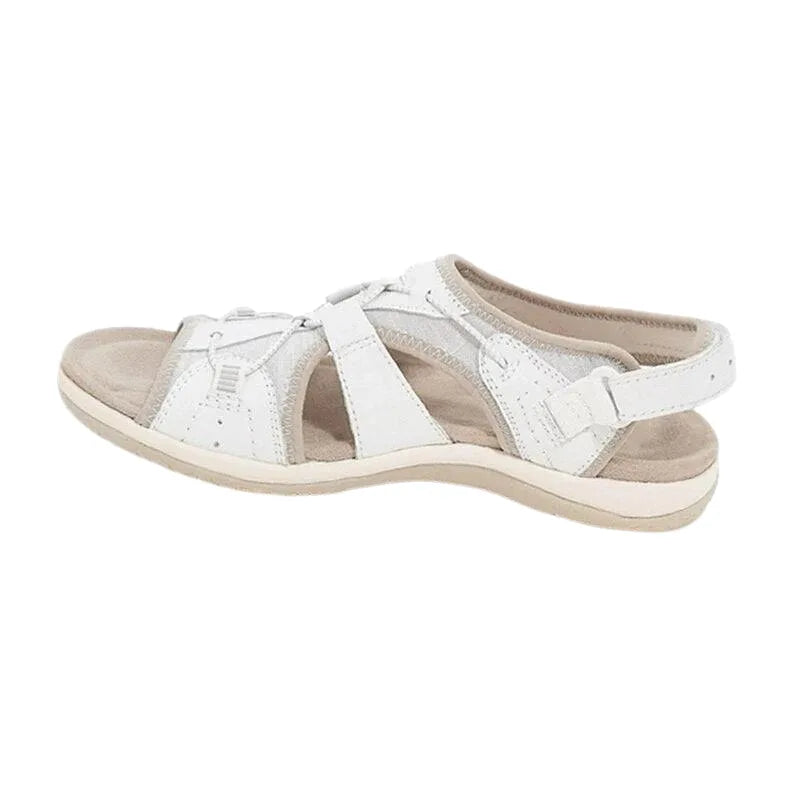 White velcro strap cutout sandal, angled view