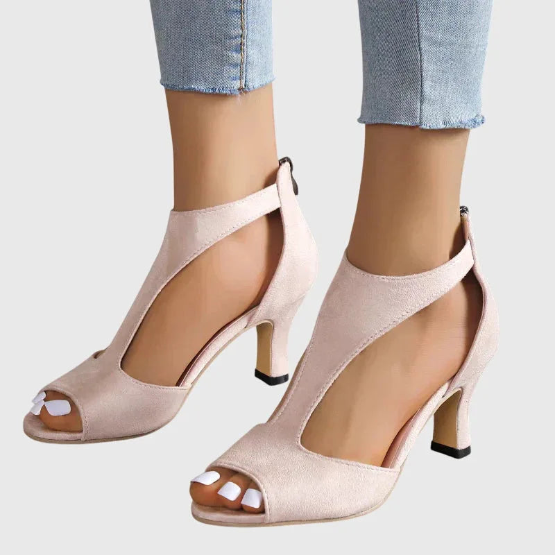 Pink cutout block heel sandal, three-quarter view