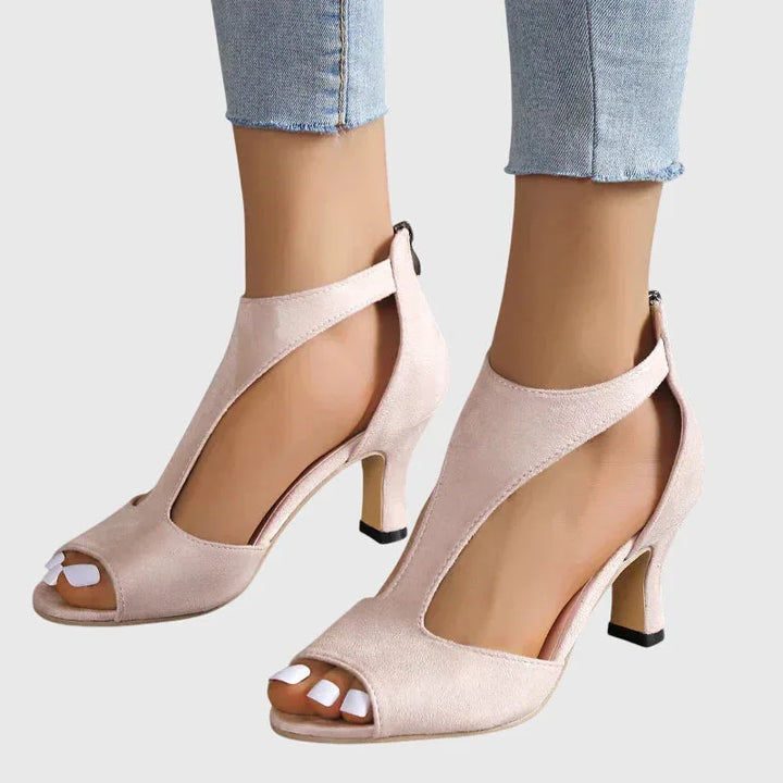 Pink cutout block heel sandal, three-quarter view