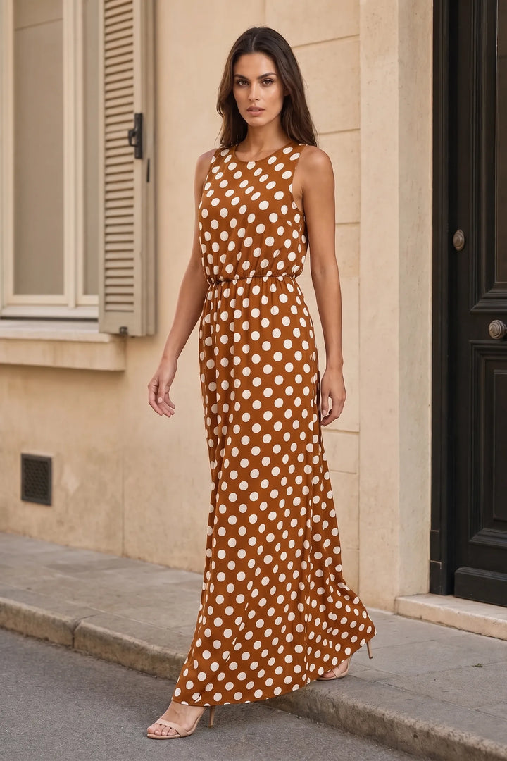 Brown polka dot maxi dress on model in three-quarter turn