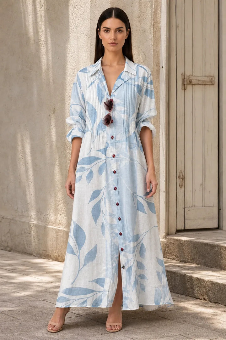 Light blue floral tiered maxi dress on model in contrapposto stance