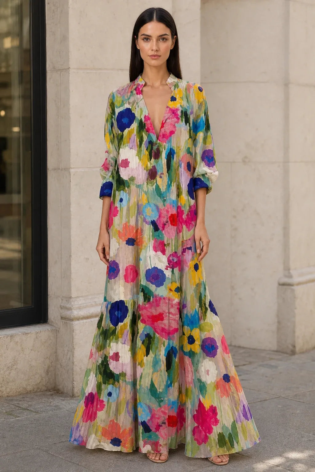 Multicolor floral tiered maxi dress on model in contrapposto stance