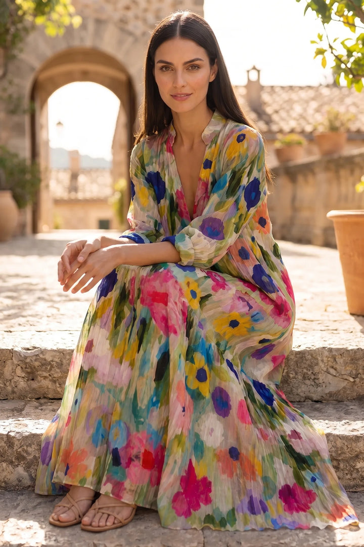 Model wearing multicolor floral tiered maxi dress in outdoor lifestyle setting