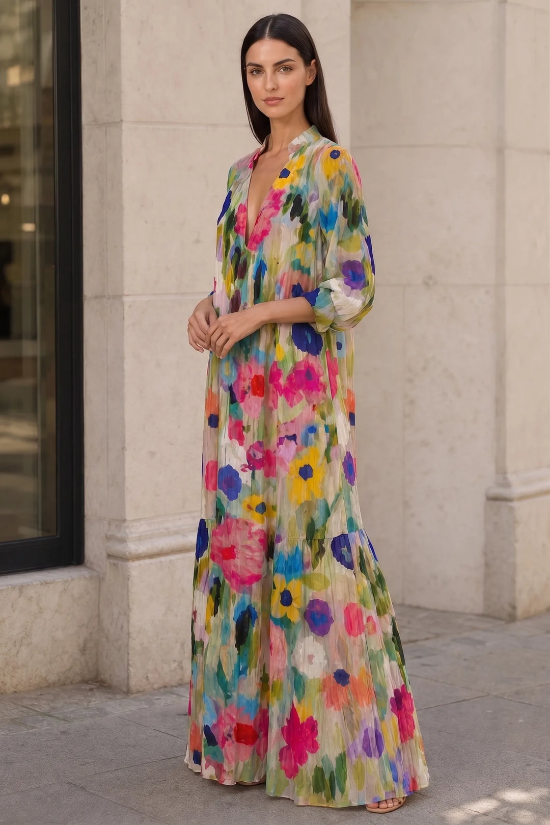 Multicolor floral tiered maxi dress on model in three-quarter turn
