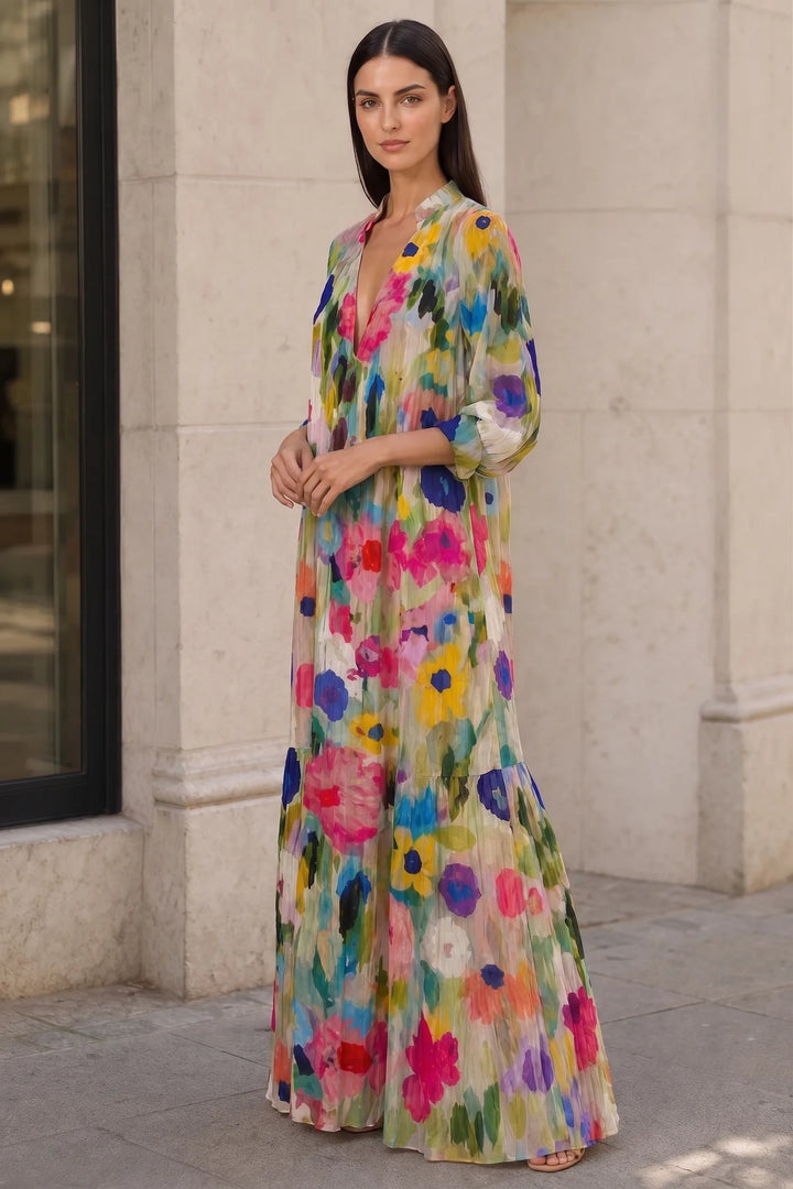 Multicolor floral tiered maxi dress on model in three-quarter turn