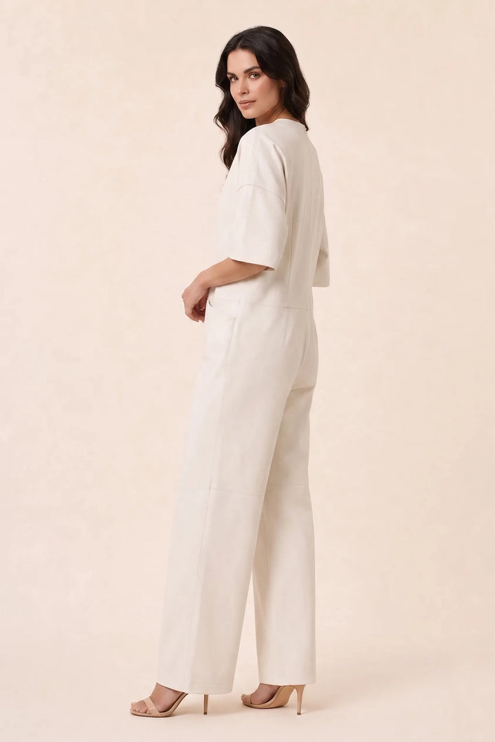 White wide-leg jumpsuit on model in three-quarter turn