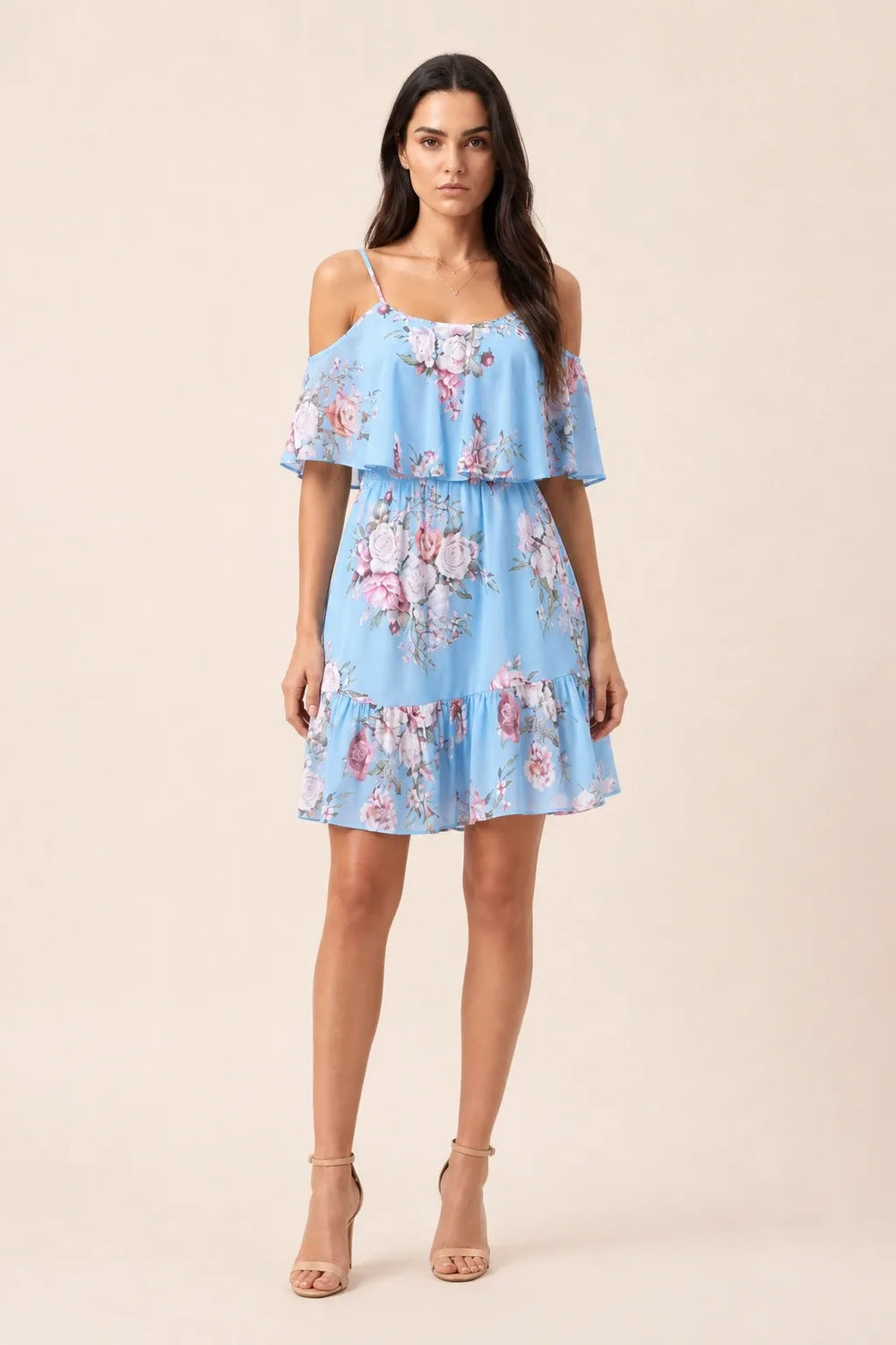 Light blue cold shoulder ruffle mini dress on model in contrapposto stance