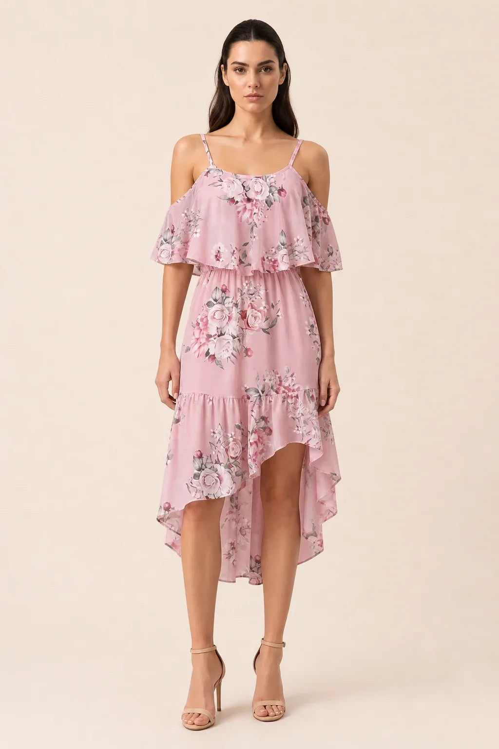 Pink cold shoulder ruffle mini dress on model in contrapposto stance