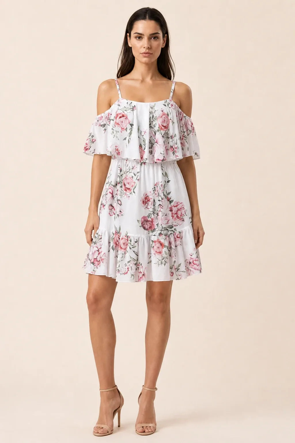 White cold shoulder ruffle mini dress on model in contrapposto stance