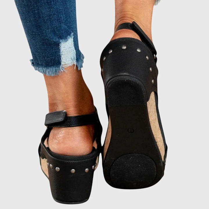 Beige wedge platform sandal alternate angle highlighting wedge and toe shape