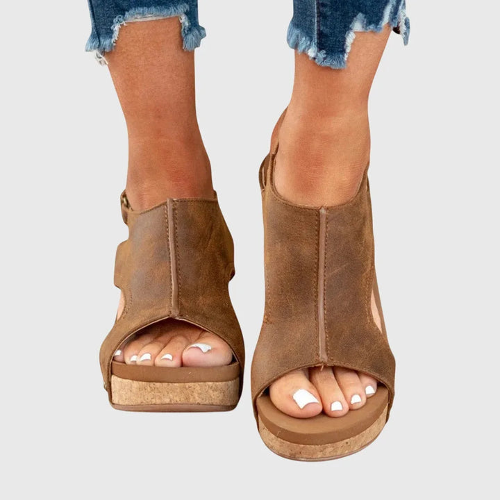 Brown wedge platform sandal view showing warm-toned straps and platform sole