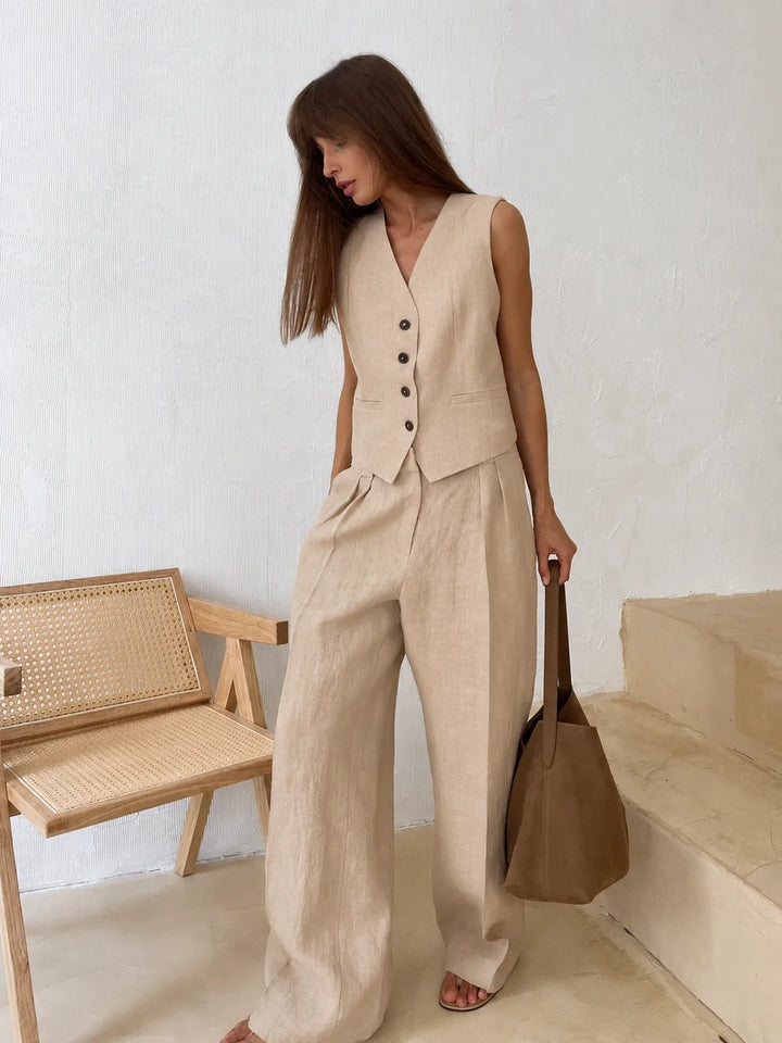Beige sleeveless vest and wide-leg trouser co-ord set, model facing forward