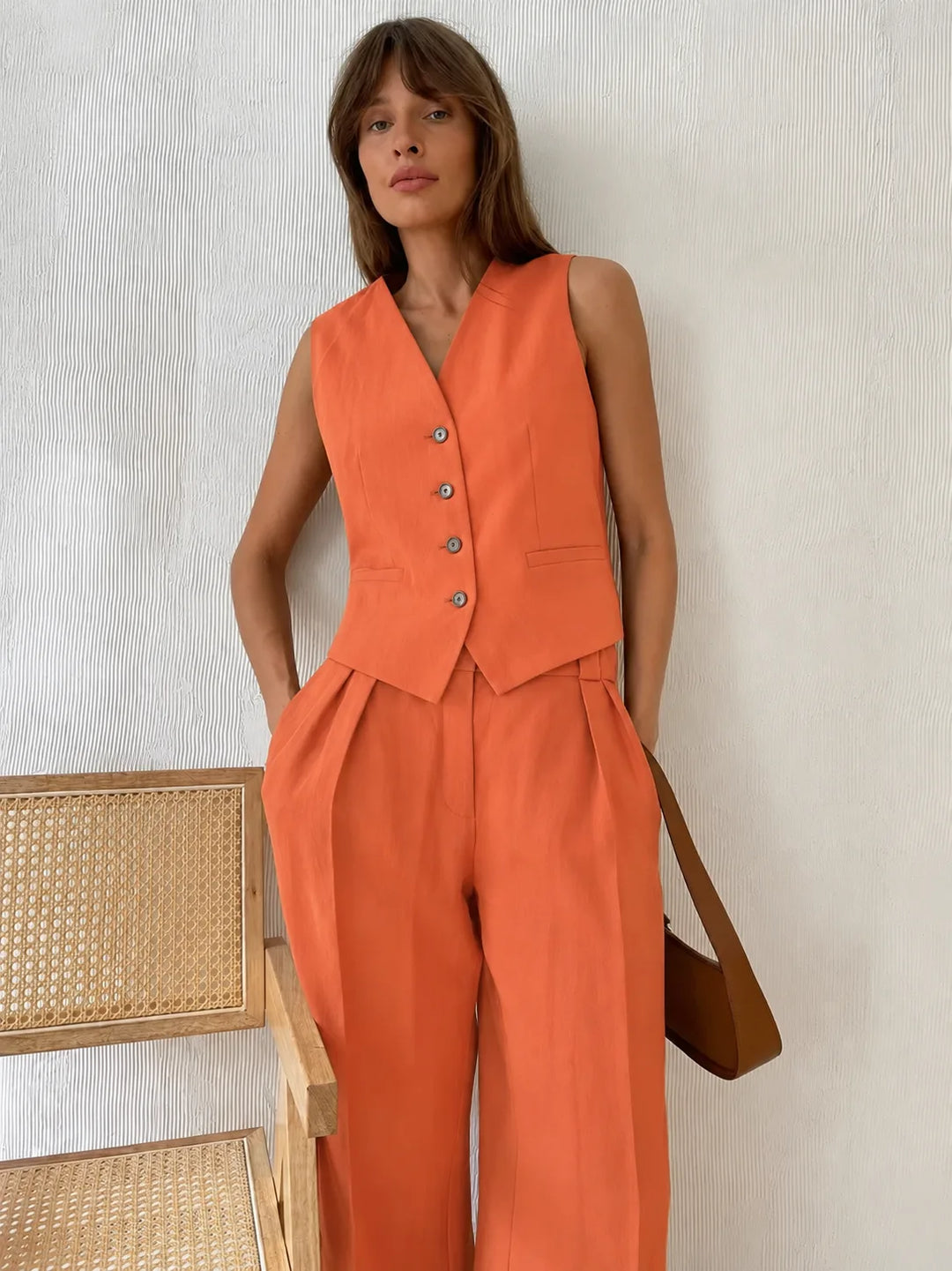 Beige sleeveless vest and wide-leg trouser co-ord set, alternate front view