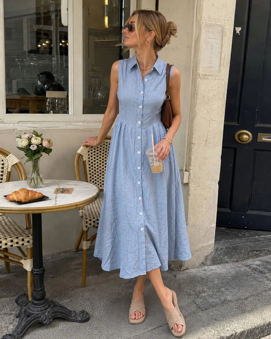 Blue button-front shirt midi dress on model facing forward, belted waist