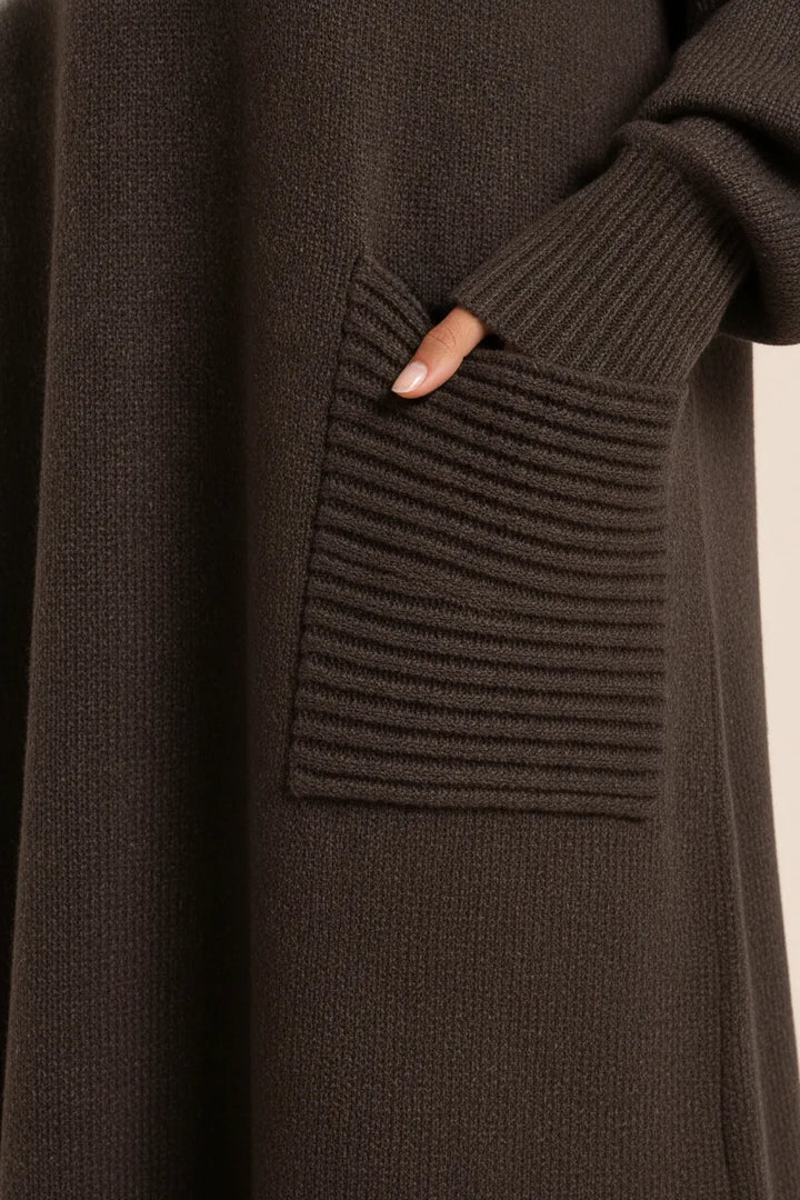 Close-up detail of coffee brown ribbed turtleneck sweater maxi dress