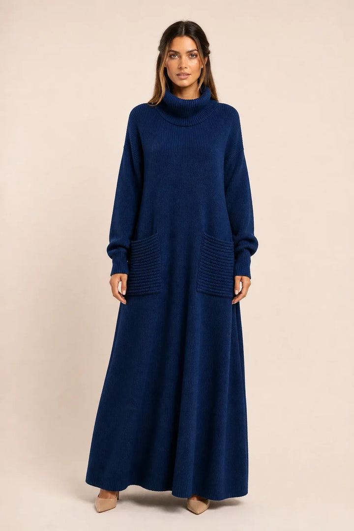 Navy blue ribbed turtleneck sweater maxi dress on model in contrapposto stance