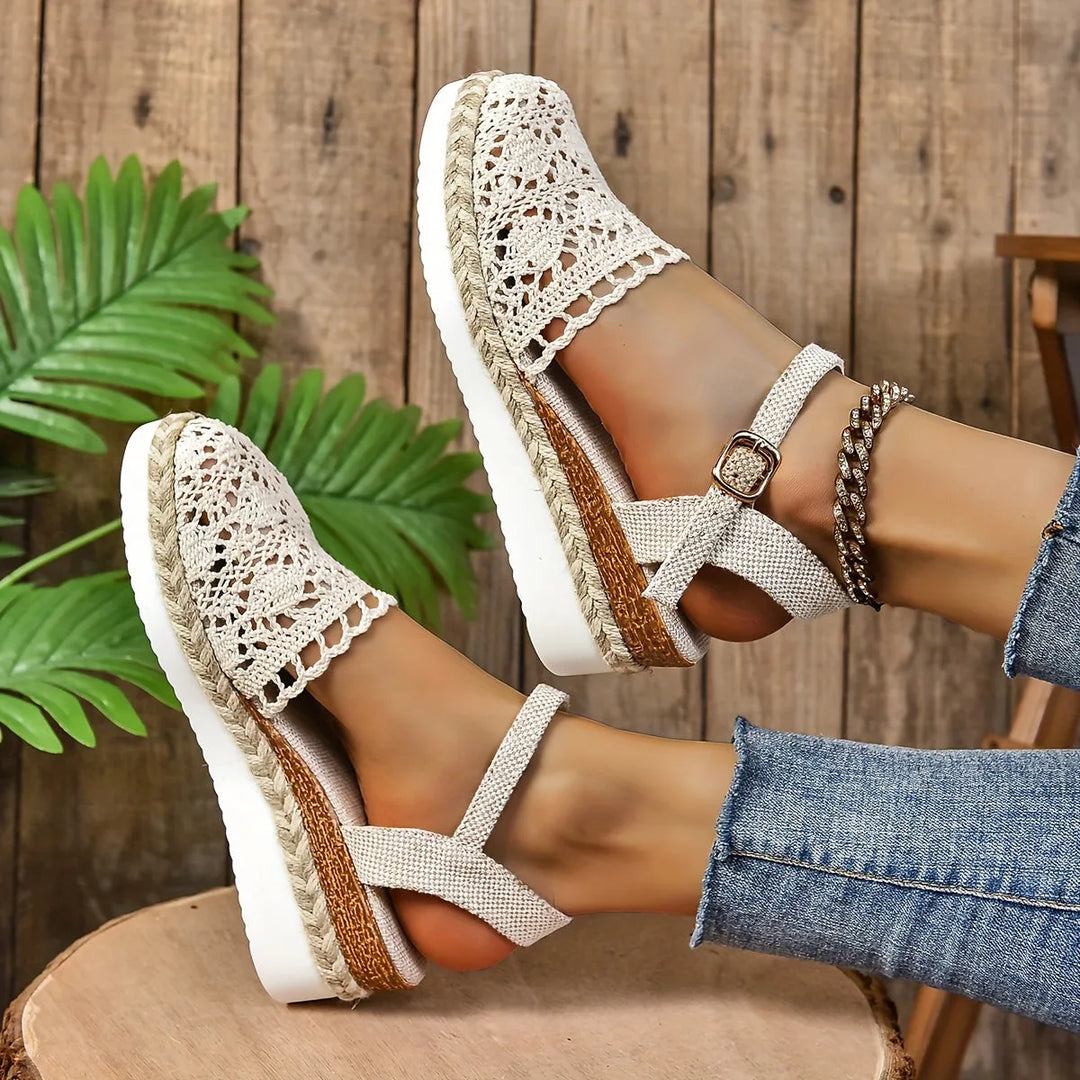 Beige crochet espadrille sandal styled on foot, outdoor setting