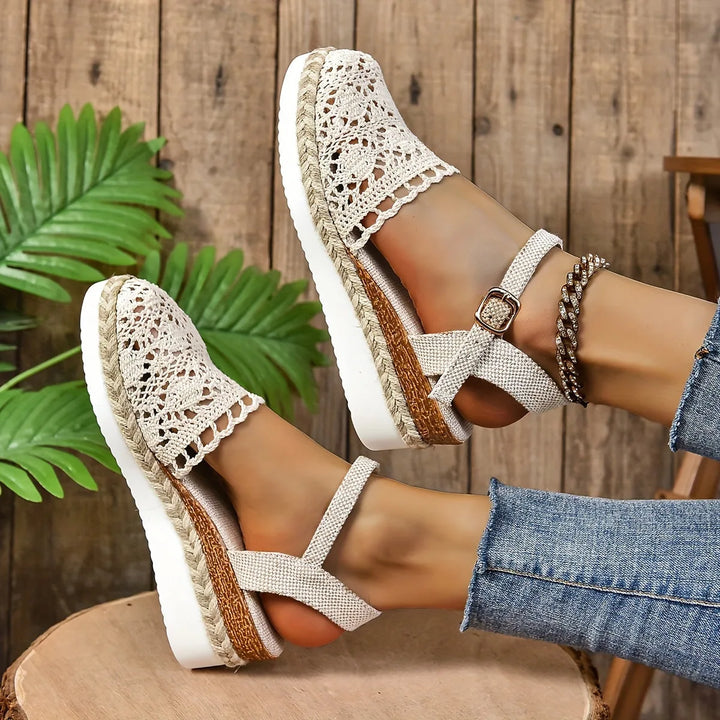 Beige crochet espadrille sandal styled on foot, outdoor setting
