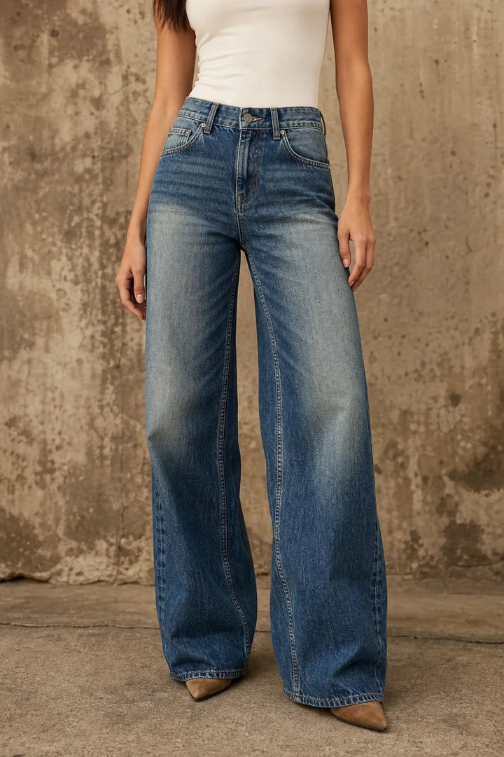 Blue wide-leg flare jeans on a model in a contrapposto stance