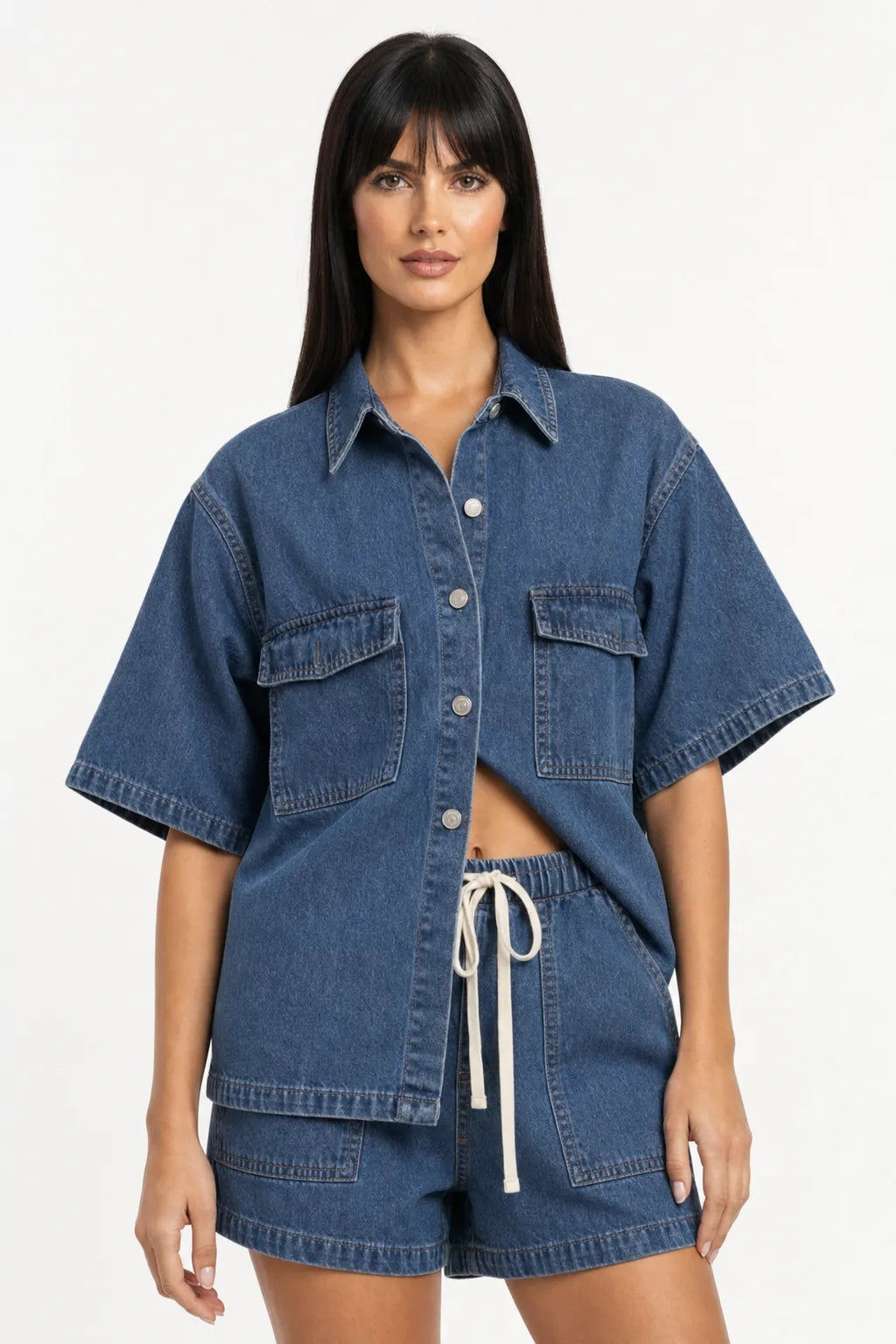 Navy blue denim shirt set on model in contrapposto stance