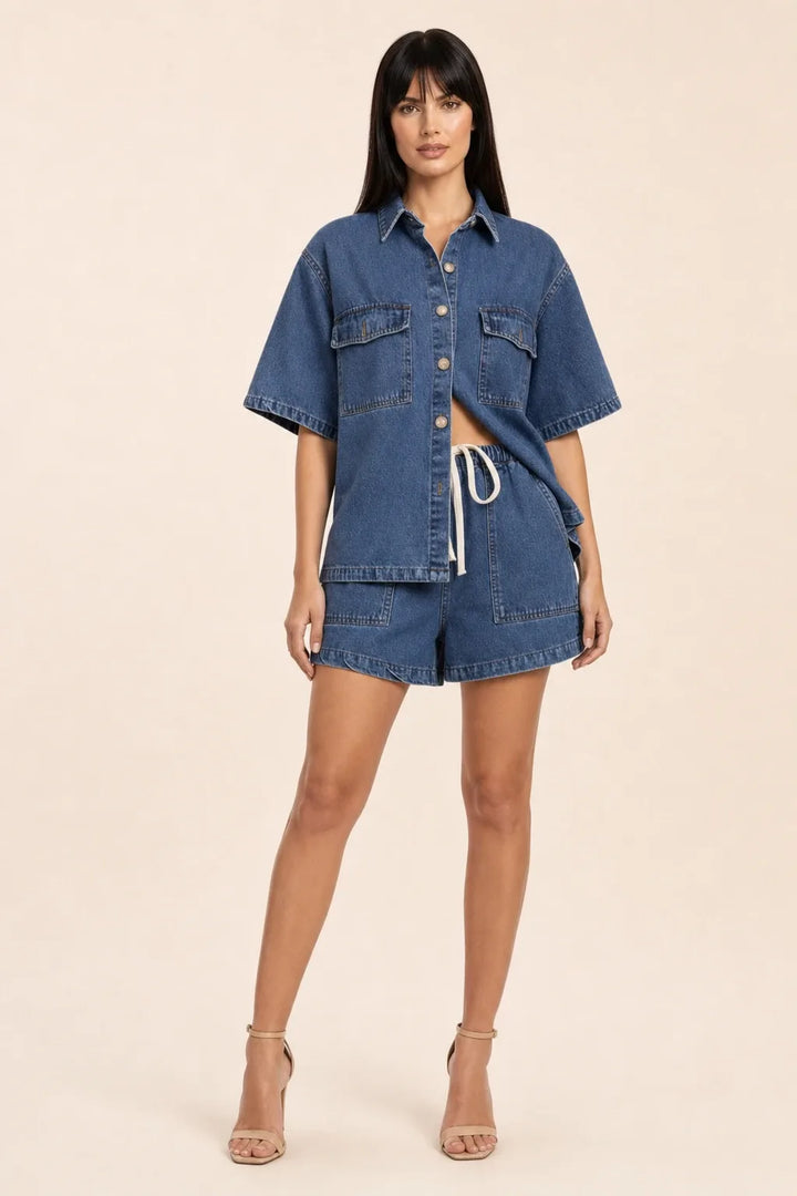 Navy blue denim shirt set on model in contrapposto stance