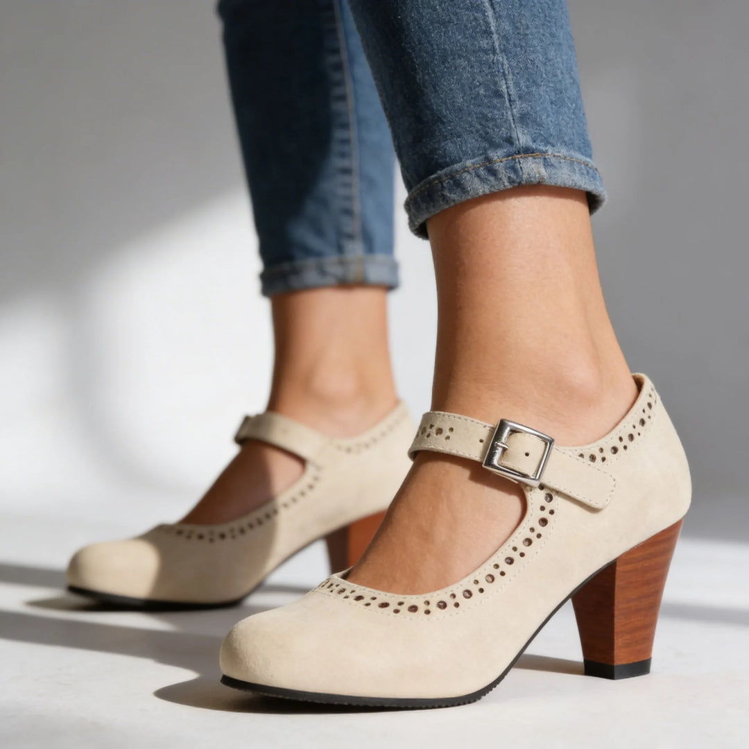 Beige mary jane brogue pump, full shoe view showing overall style and construction