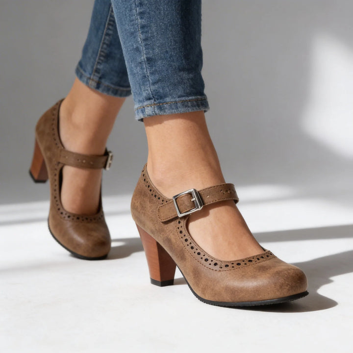 Brown mary jane brogue pump, front view showing toe cap and strap