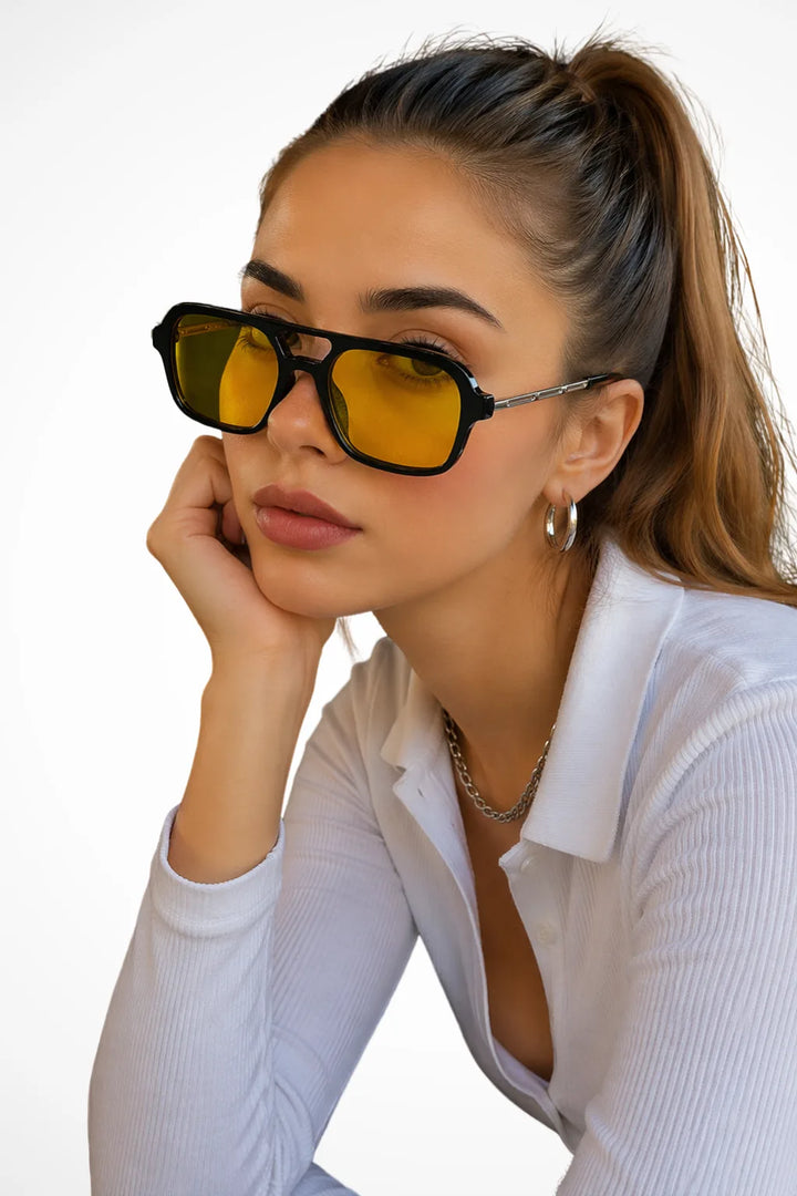 Square double bridge sunglasses with black frames and yellow lenses, front view