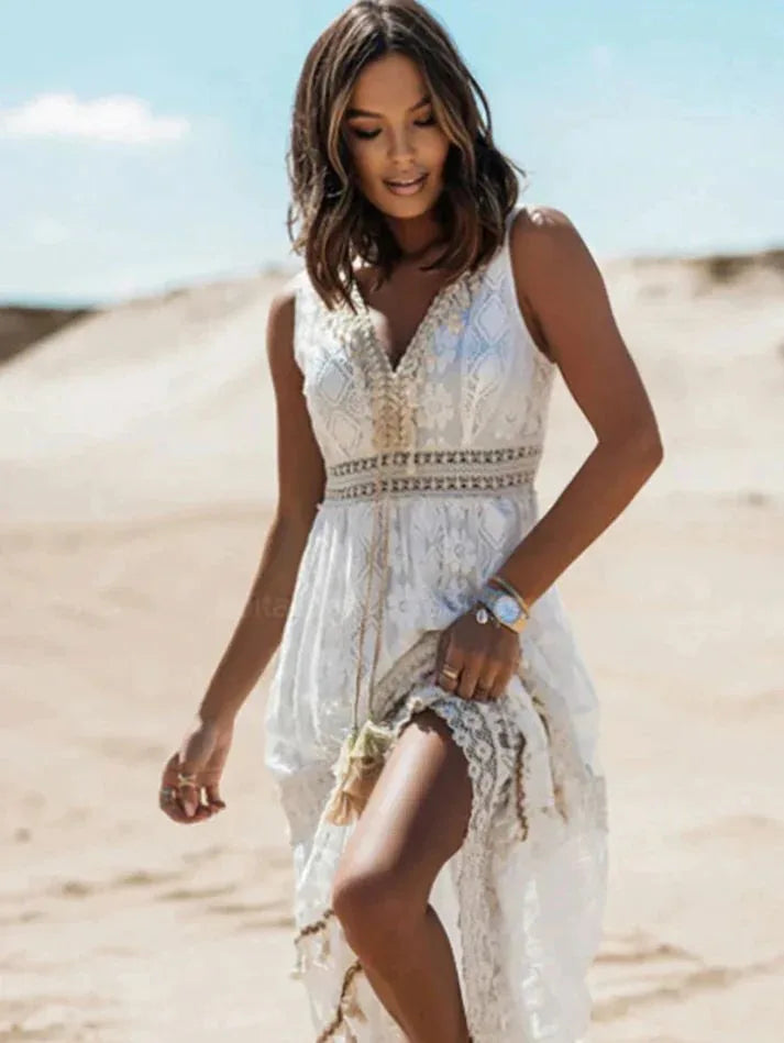 White lace tiered maxi dress on model in three-quarter turn