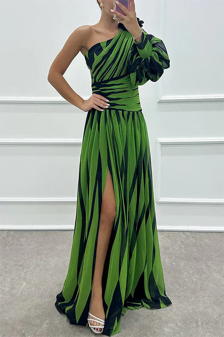 Woman in a white one-shoulder floor-length gown with slit, alternate standing pose