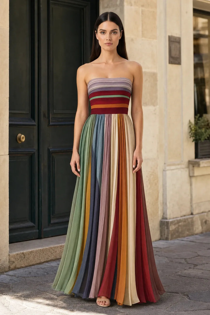 Striped pleated floor-length gown on model in contrapposto stance