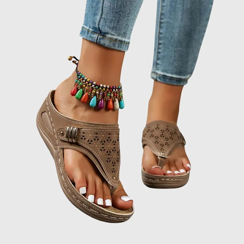 Black wedge thong sandal, alternate angle view of platform and toe post