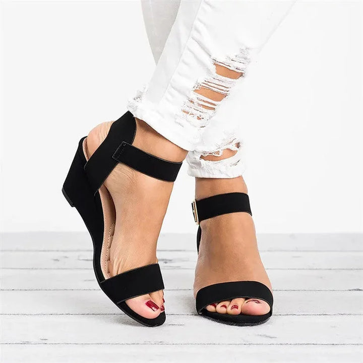 Black ankle strap wedge sandal, front view