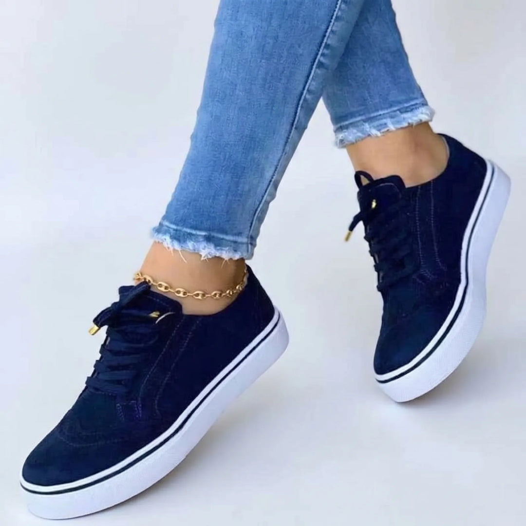 Blue flatform brogue sneaker, front view