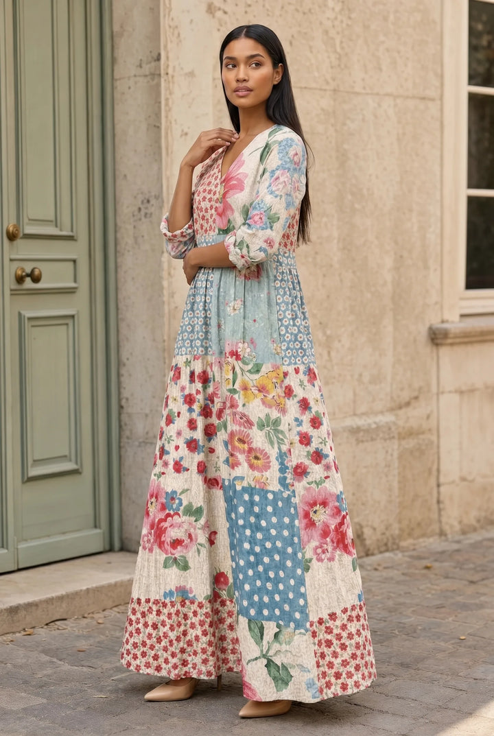 Light blue patchwork floral maxi dress on model in three-quarter turn