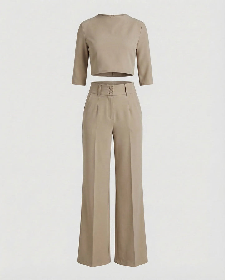 Woman wearing a khaki wide-leg trouser co-ord set with matching blazer
