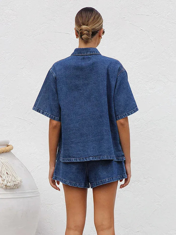 Model in a blue denim shirt co-ord set, angled pose