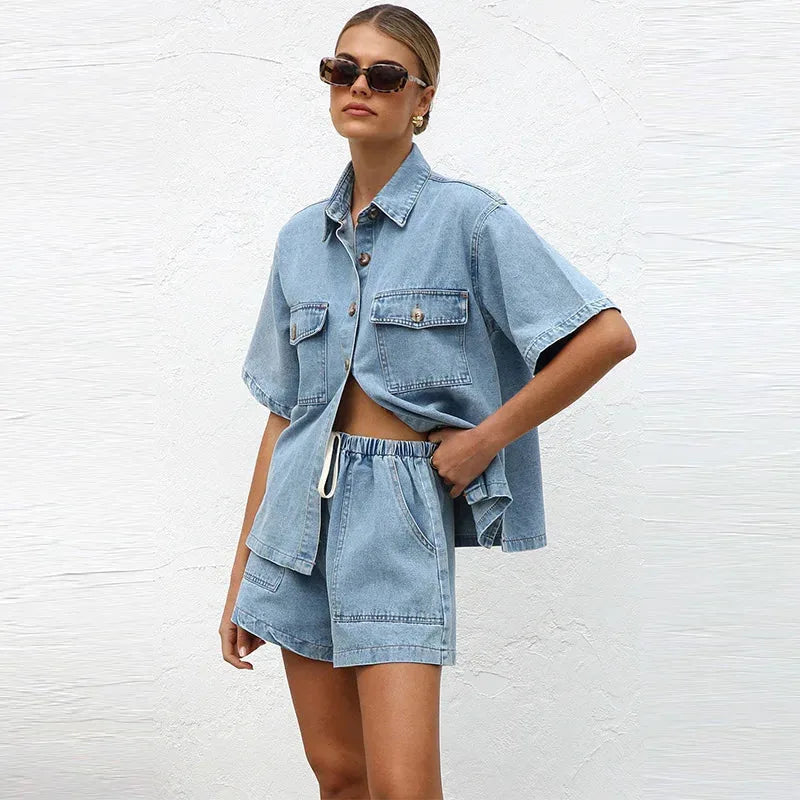 Model facing forward in a sky blue denim shirt co-ord set