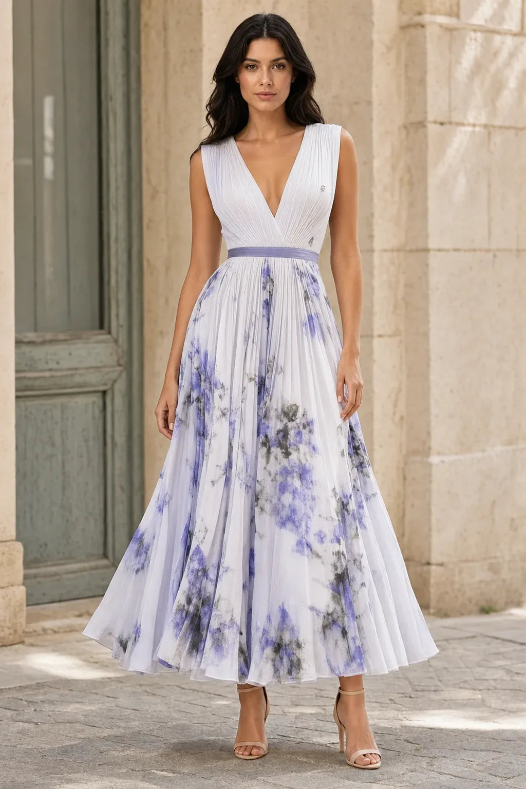 Purple pleated floral midi dress on a model in a contrapposto stance