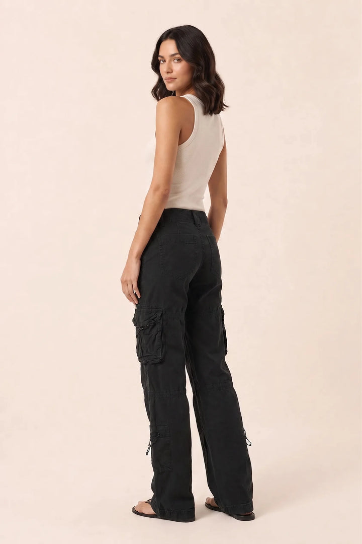 Black wide-leg cargo pants on a model in a three-quarter turn pose