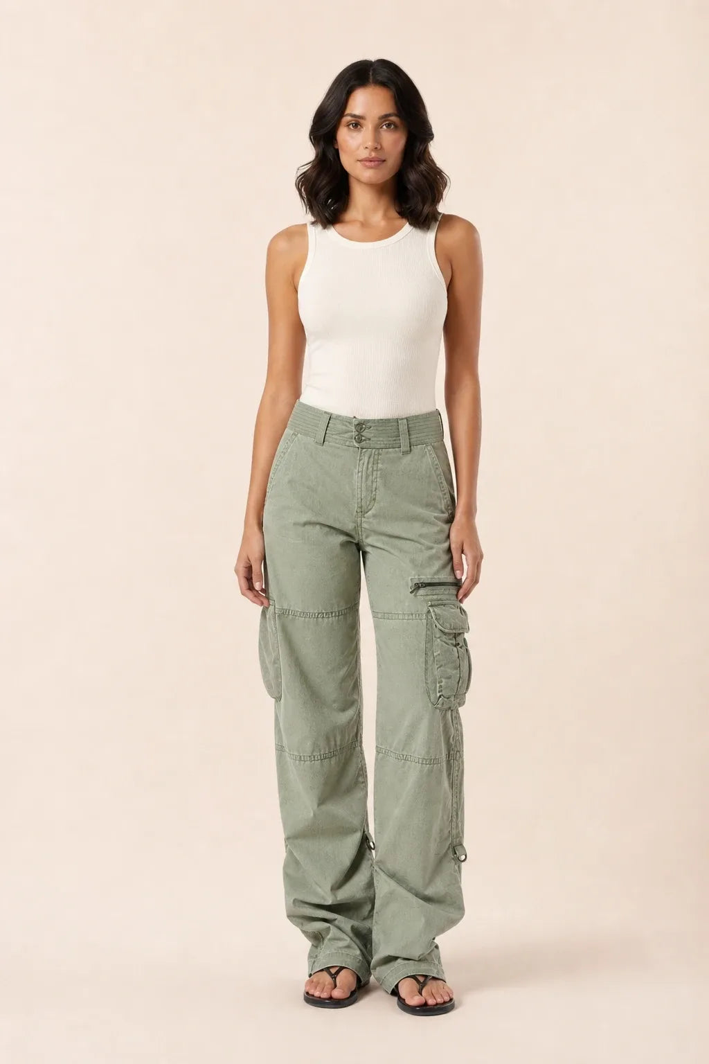 Green wide-leg cargo pants on a model in a contrapposto stance