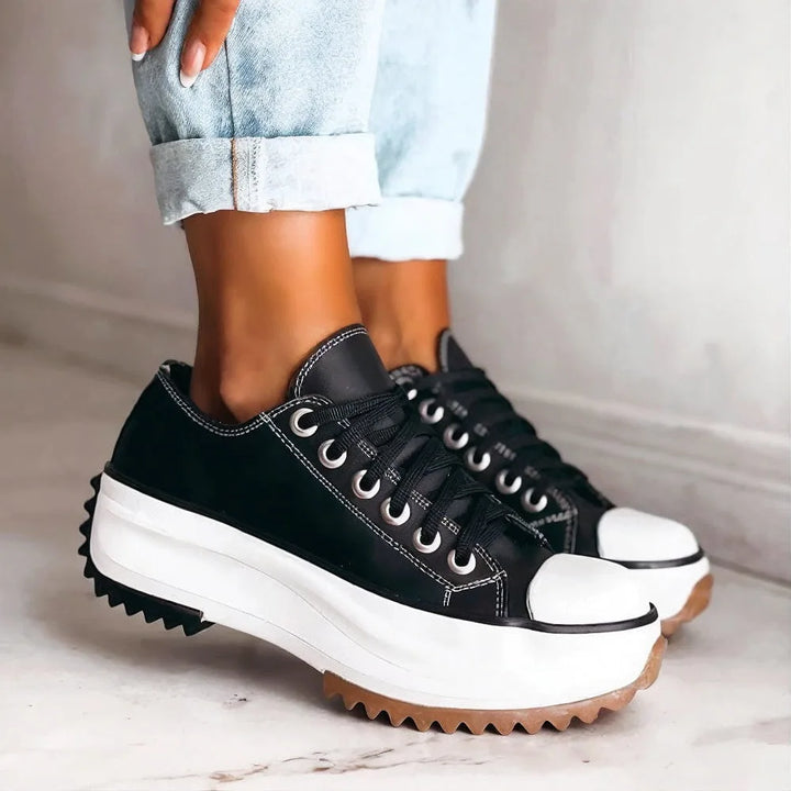 Black lug sole platform sneaker, front view