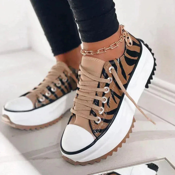 Tiger print lug sole platform sneaker, front view