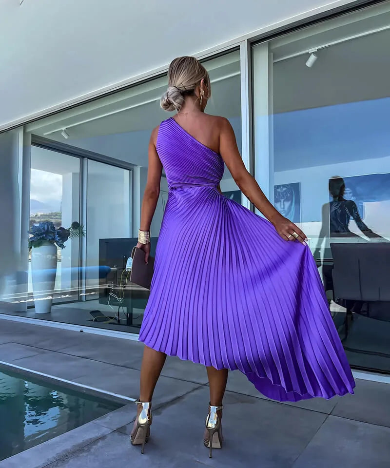 Purple pleated one-shoulder midi dress on standing model