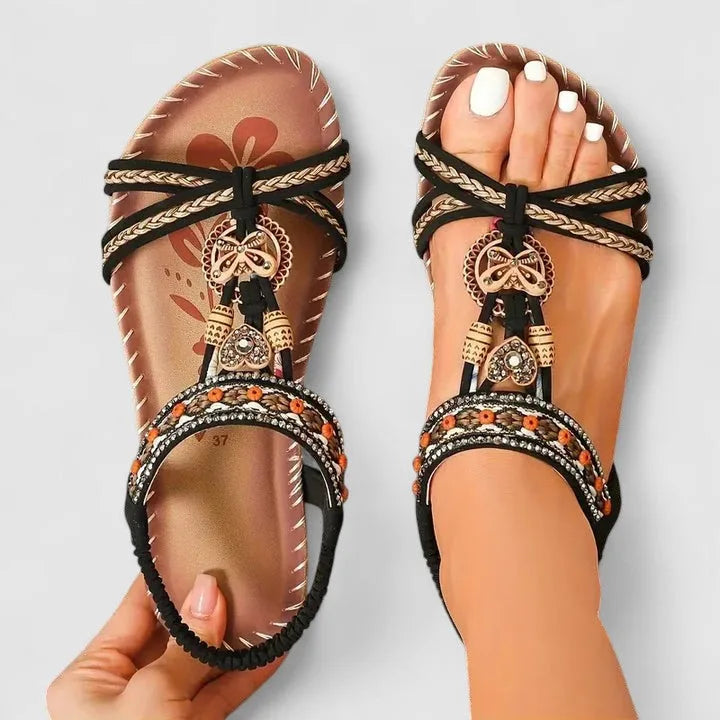 Cobalt blue beaded flat sandal showing heel and back strap detail