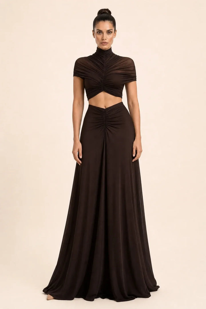 Coffee-toned ruched cut-out maxi dress on model in contrapposto stance