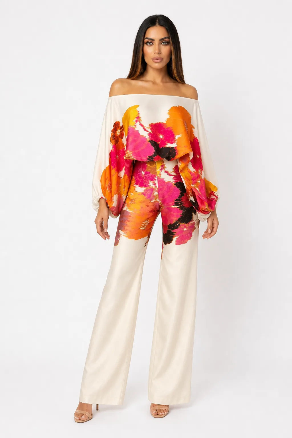 Multicolor abstract print matching trouser set on model in contrapposto stance